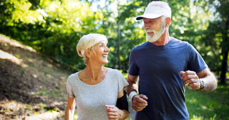 Fitness, sport, people, exercising and lifestyle concept - senior couple running Female medical provider listening intently and with compassion to a patient.